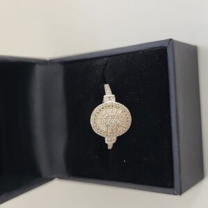 14kt white gold 1/2 carot total weight. Diamond cluster ring .